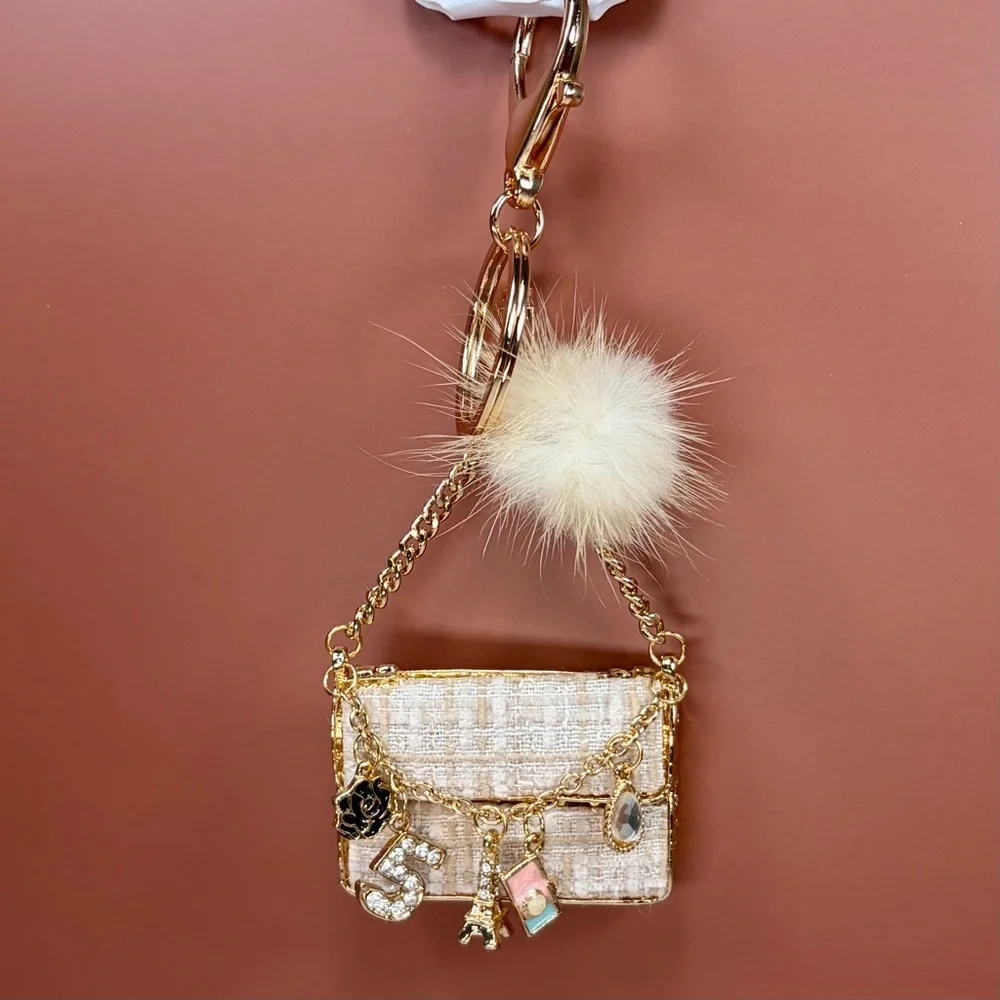 Chic Cream Tweed Mini Bag Keychain with Gold Chain and Pom